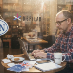 UK shop owner managing SEO at storefront desk