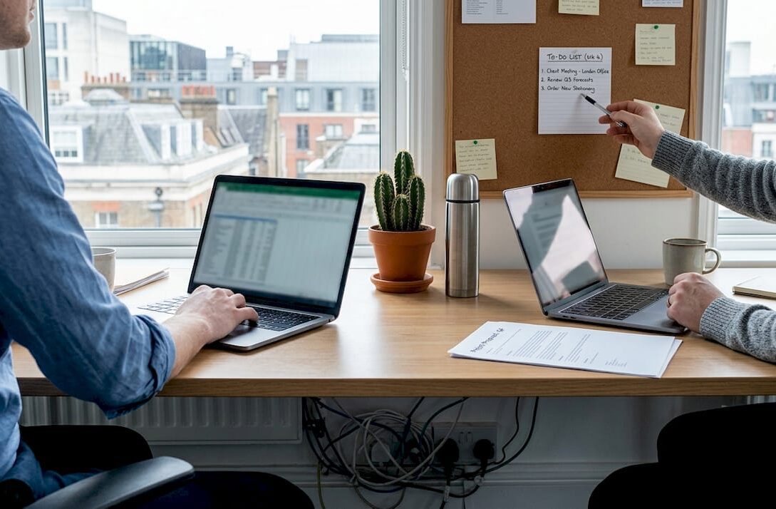 Managers working with business automation software